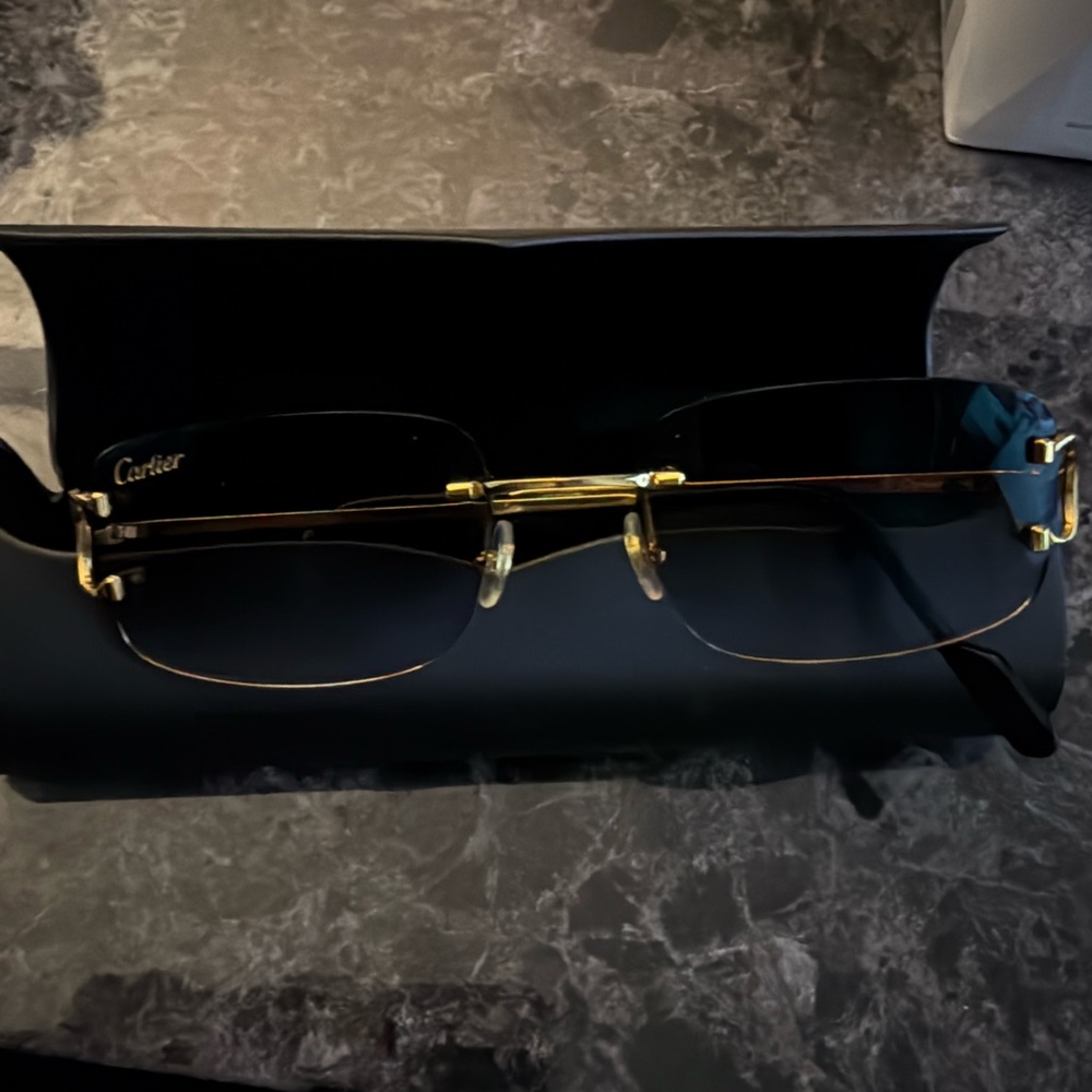 Cartier Gold Frame Sunglasses with Dark Lenses with red tint